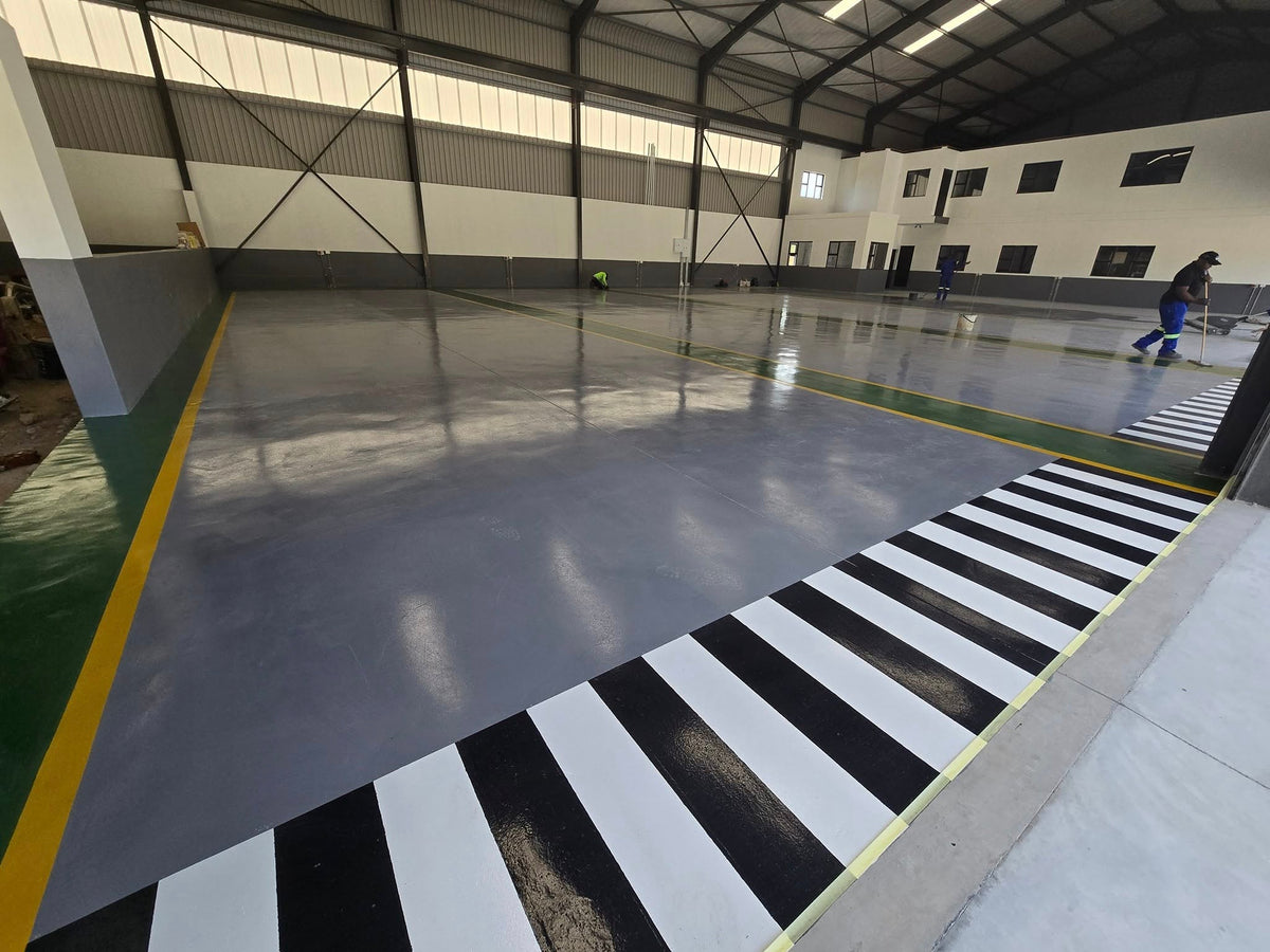 INDUSTRIAL EPOXY FLOORING WITH SAFETY LINE MARKING