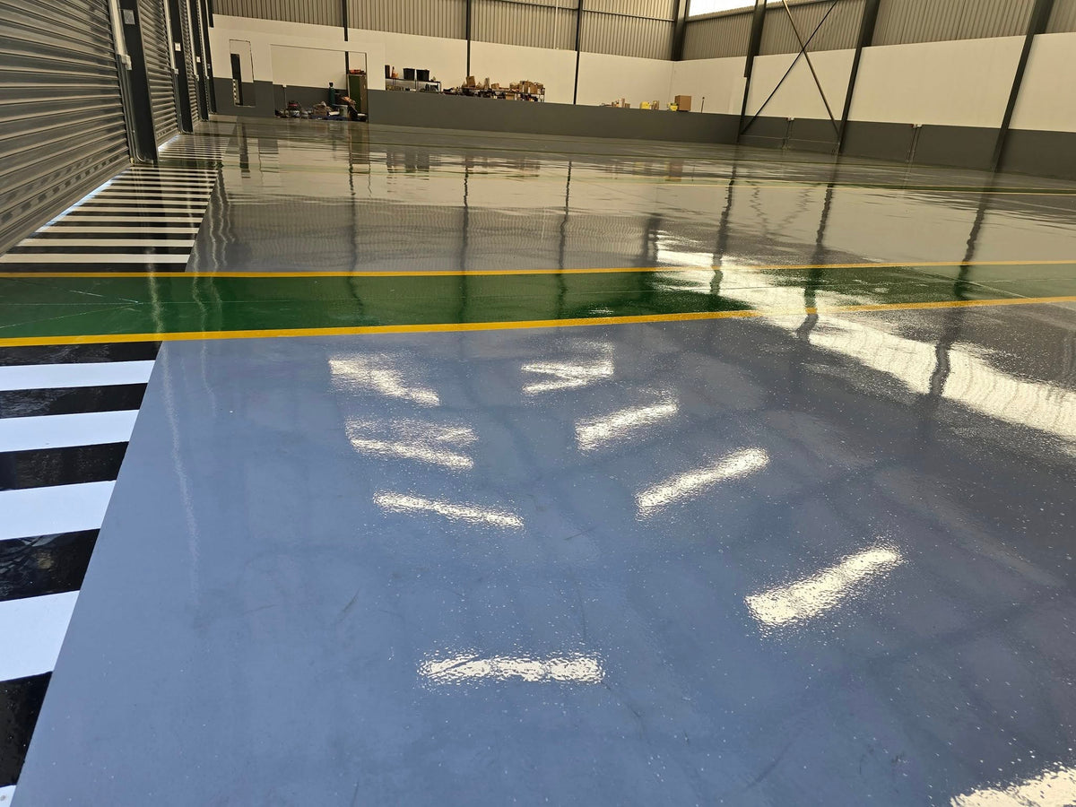 INDUSTRIAL EPOXY FLOORING WITH SAFETY LINE MARKING